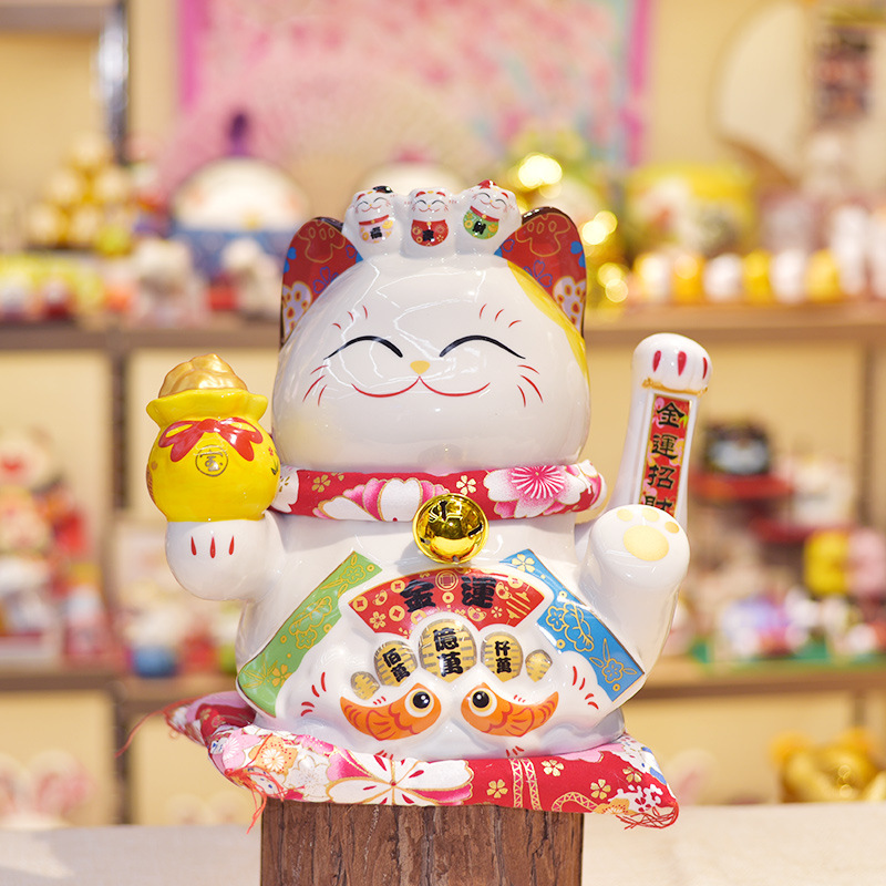 Mèo Thần Tài Vẫy Tay cầm Hũ Vàng Koban 2023